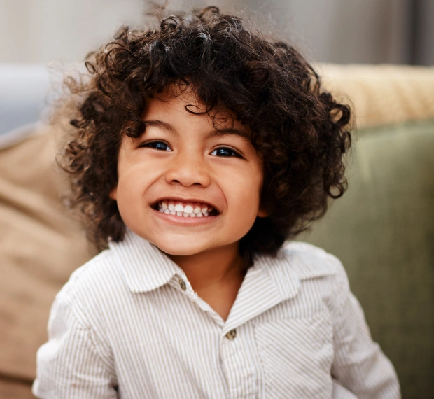 Smiling child during a pediatric dental visit