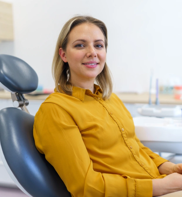 Patient receiving a dental cleaning and examination