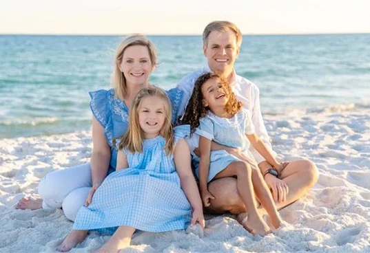 Dr. Kaitlin Forshee with her family on the beach