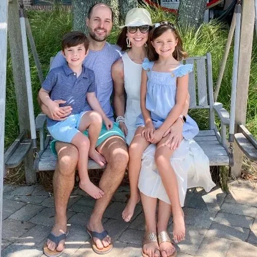Family enjoying an outdoor vacation portrait session