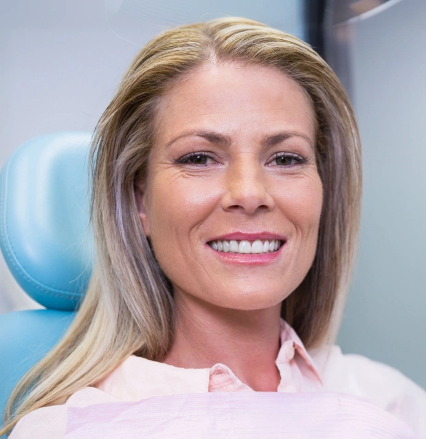 Smiling woman representing preventive dental care
